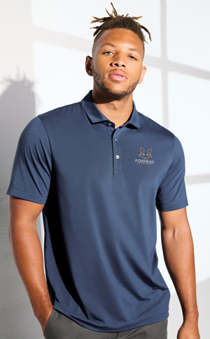 young man wearing navy polo